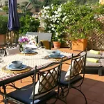 Apartamento En El Puerto De Soller Con Gran Terraza Privada Y Vistas Al Mar. Piscina Comunitaria. Localizado En Un Zona Tranquila Y Muy Soleada. Wifi Gratis Disponible. Parking.